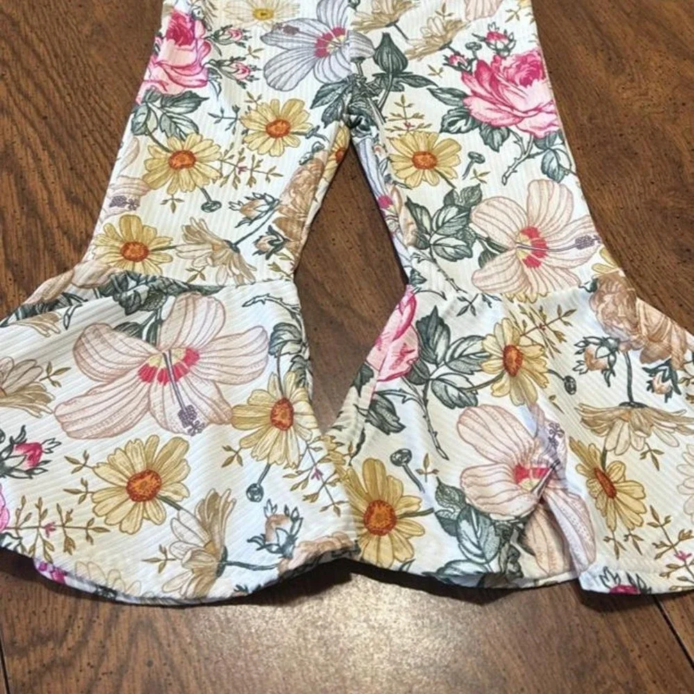 Retro floral bellbottom boutique jumpsuit romper for your little trendsetter!